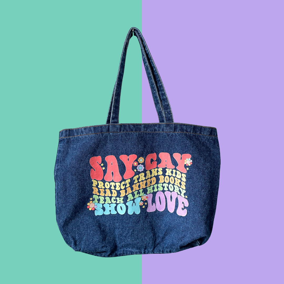 Graphic denim tote bag with colourful advocacy slogan