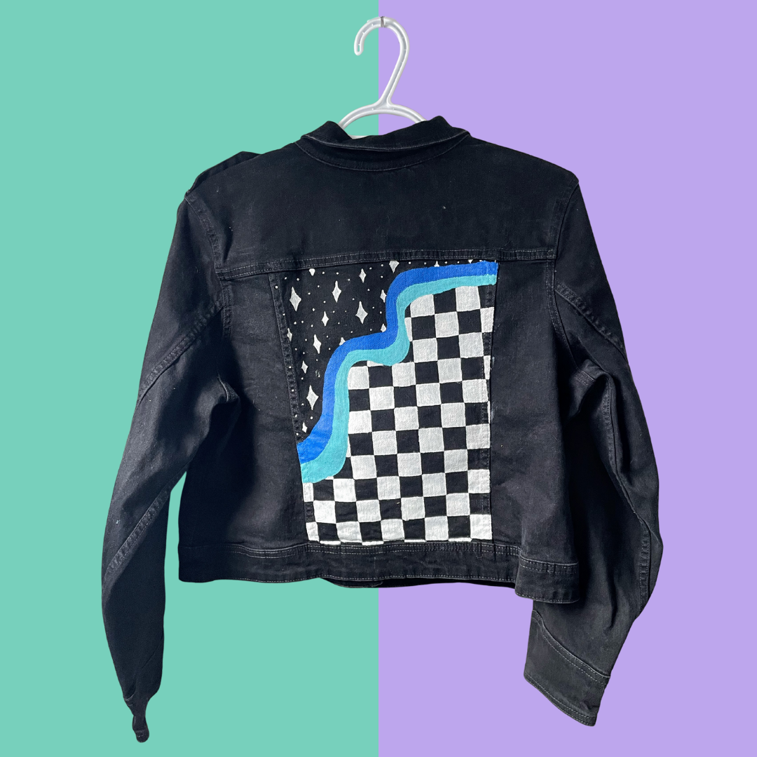 Hand painted checkerboard and wave graphic black denim jacket
